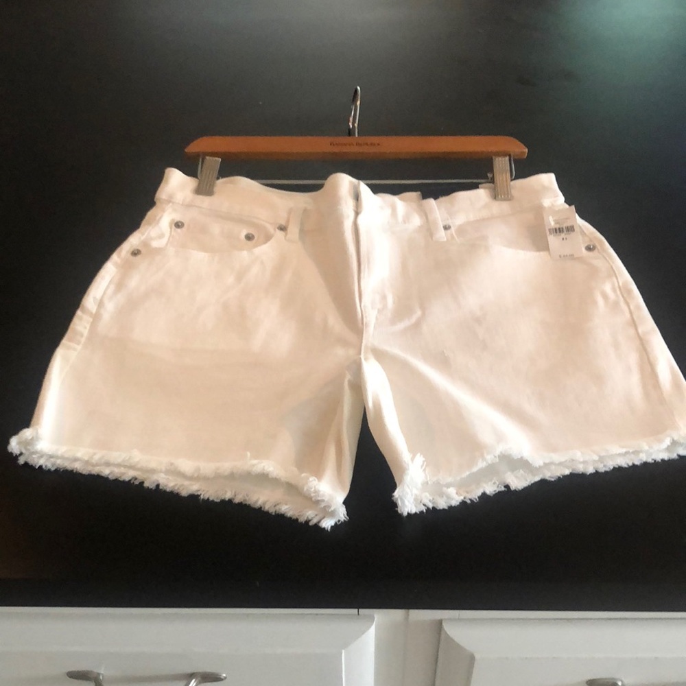 Gap white denim shorts with frayed bottom